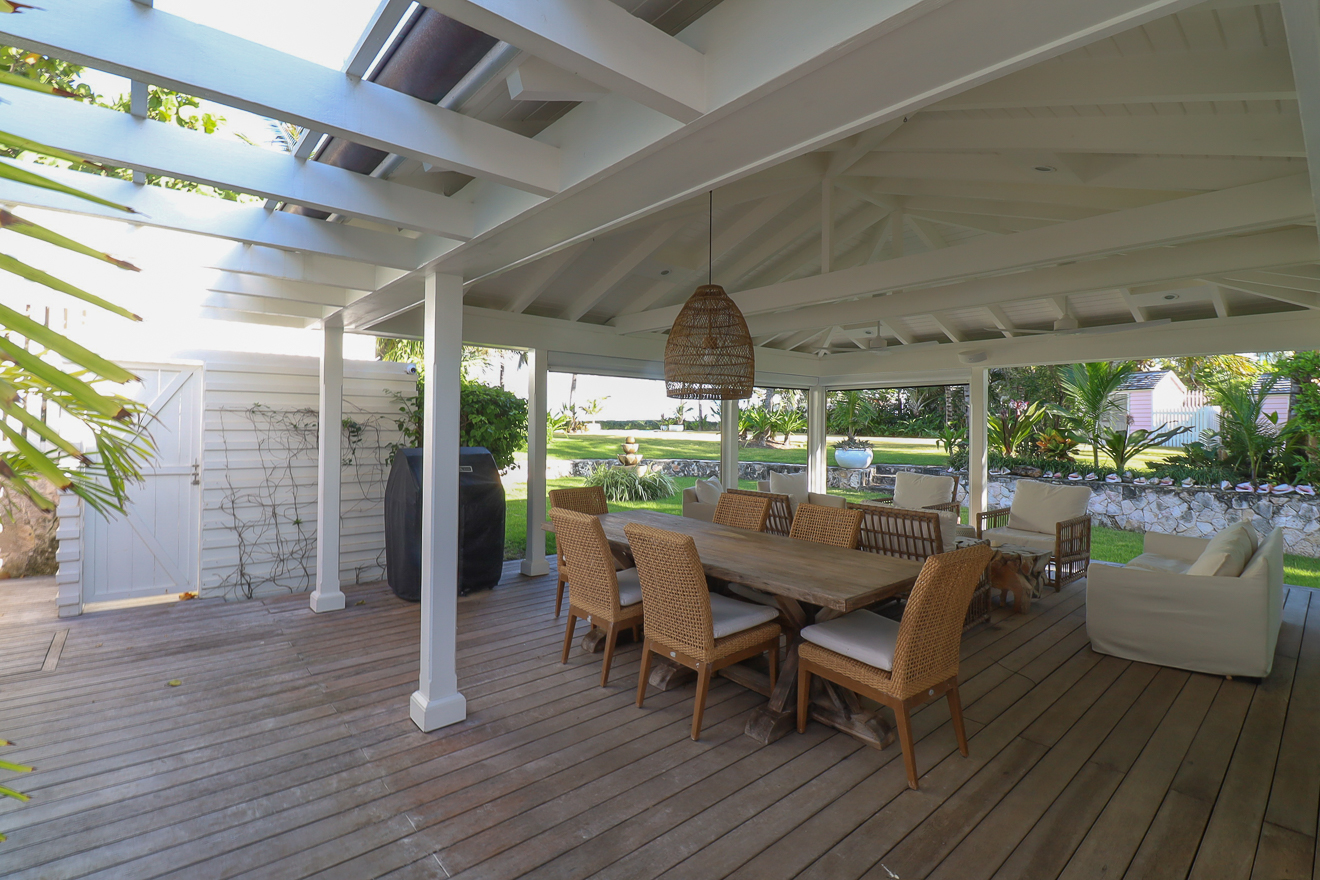 Outdoor deck at Hummingbird Cottages perfect for Bahamas wedding reception