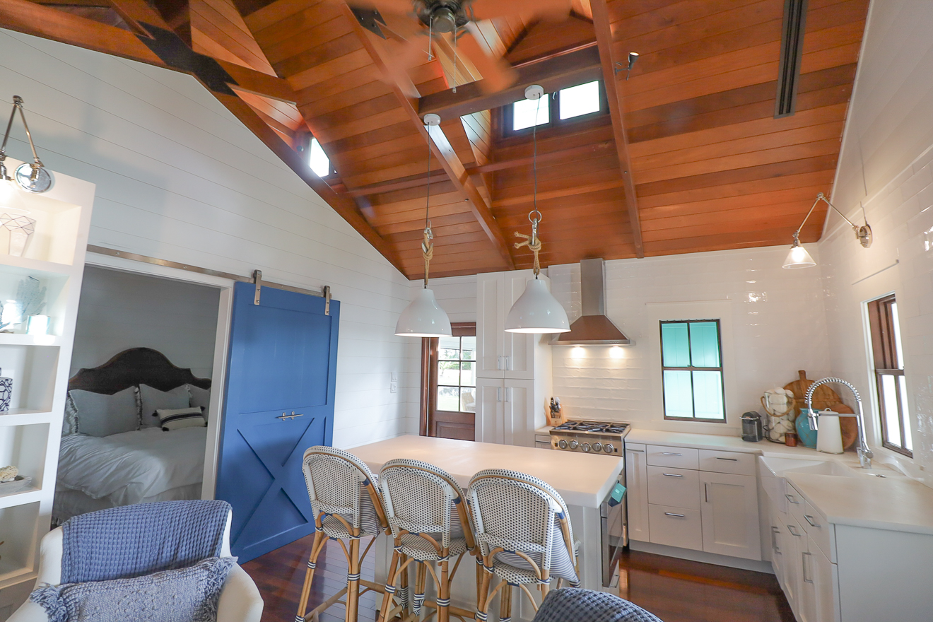 Fully equipped kitchen with vaulted cedar ceiling at Hummingbird Cottages