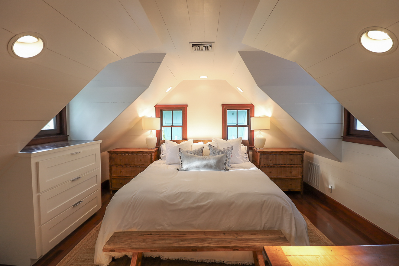 Cottage Two loft bedroom with vaulted ceiling at Hummingbird Cottages